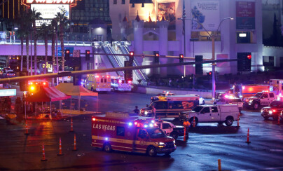 Las Vegas Metro Police and medical workers stage in the intersection of Tropicana Avenue and Las Vegas Boulevard South after a mass shooting at a music festival on the Las Vegas Strip in Las Vegas, Nevada, U.S. October 1, 2017. REUTERS/Las Vegas Sun/Steve Marcus TPX IMAGES OF THE DAY